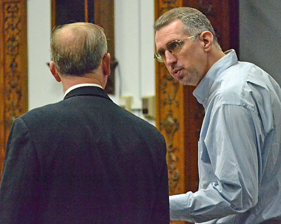 Shawn Jones confers with Attorney Scott Gordon  (Photo by Lisa Mosier)