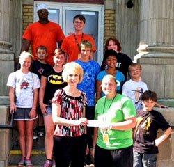 Rhonda Belt of the Van Wert Service Club, and Hannah Phlipot, YWCA Summer Food Program supervisor, are shown with other YWCA staff, volunteers and some Summer Food Program participants. (YWCA photo)