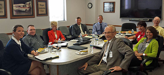 BR&E team members visit with Kim and Scott Braun at Braun Industries. (photo submitted)