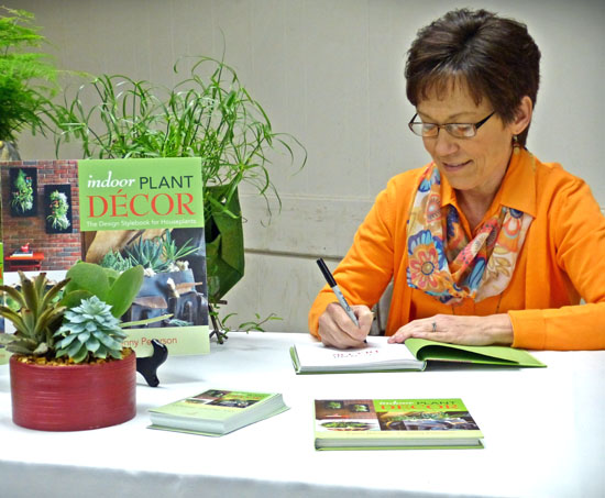 Kylee Baumle at a book signing for her book, "Indoor Plants Décor: Design Stylebook for Houseplants". (photos submitted)