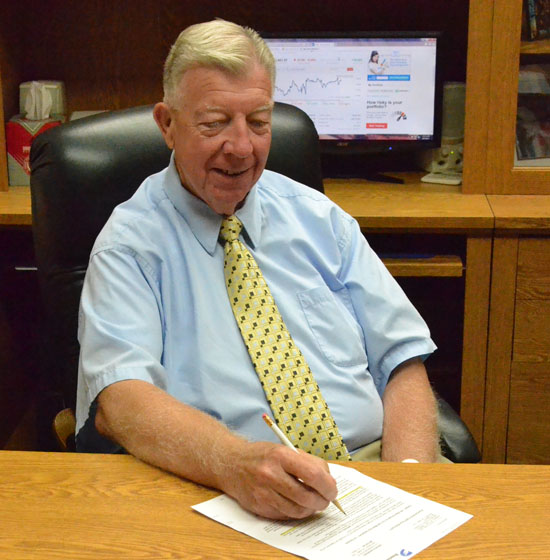 Van Wert County Foundation Executive Secretary Larry Wendel works at his desk on Monday. (Dave Mosier/Van Wert independent)