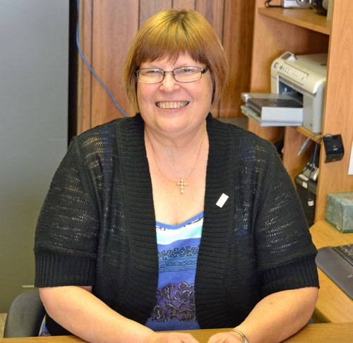 New Red Cross Community Executive Sandy Lane at her desk in the local Red Cross office. (Dave Mosier/Van Wert independent)