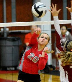 Van Wert junior Alexa Dunlap pounds one over during last night's volleyball match with Paulding. (Jan Dunlap/Van Wert independent)