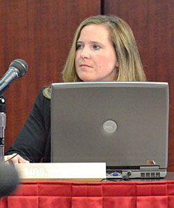 New Van Wert City Board of Education member Deb Compton listens to a report by Treasurer Mike Ruen during Wednesday's August board meeting. (Dave Mosier/Van Wert independent)