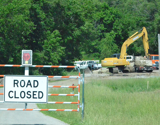 A Van Wert County Engineer's Department bridge crew works on a bridge west of Wren earlier this year. (Dave Mosier/Van Wert independent)
