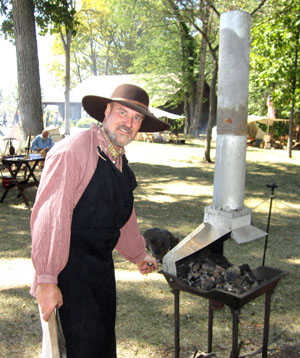 This Jennings Creek Council re-enactor shows how trappers barbecued in the 1800s. (YMCA photo)