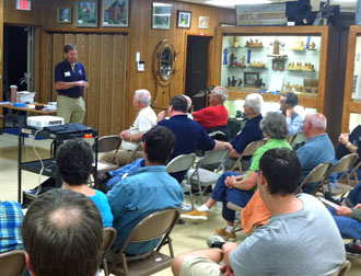 Jim Cassler, president of the Eastern Ohio Chapter of the Lincoln Highway Association, speaks during a meeting held Tuesday in the county museum annex. (photo submitted)