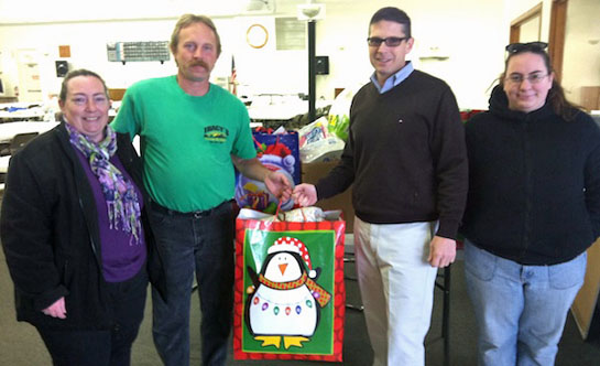 Tracy's provides gifts to Council on Aging 12-2013