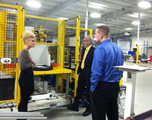 Regional economic development representative Chase Eikenbary (left) visits a local manufacturing facility on Thursday. (photo submitted)