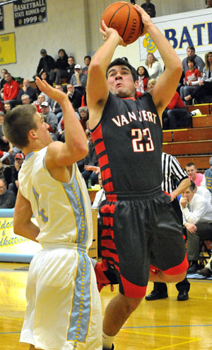 Cougar Matt Bidlack (23) goes up for a layup against Bath on Friday. Bidlack led Van Wert in scoring, but Bath still won the game 72-57. (Jan Dunlap/Van Wert independent)