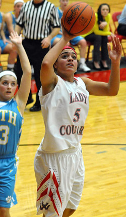 Lady Cougar Alexis Dowdy (5) shoots a jumper against Bath in a WBL nail-biter played Thursday night in the Cougar's Den. (Jan Dunlap/Van Wert independent)