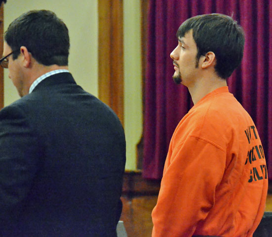 Joel Crawford, shown here with defense attorney Ryan Warnecke, was sentenced to prison on Wednesday on a charge of vandalism. (Dave Mosier/Van Wert independent)