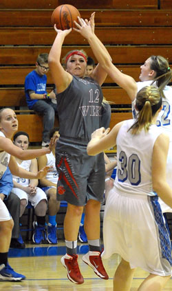 Cougar Emilie Moonshower (12) takes a shot from outside during Thursday's WBL contest against Defiance. (Jan Dunlap/Van Wert independent)