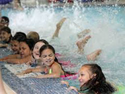 Kids showing their “kick, kick, kicks” during a previous swim session. (YMCA photo)