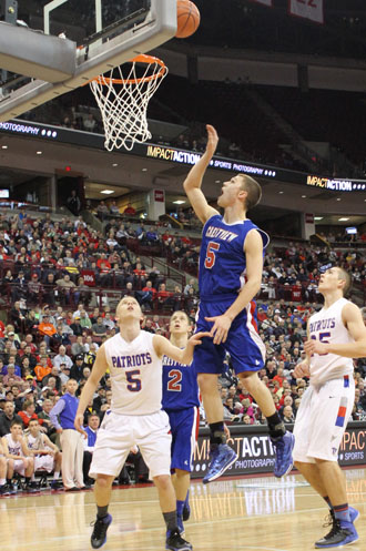 Crestview's Cam Etzler (5) goes up for a shot against New Madison Tri-Village in a Division IV state semifinal game Thursday won by the Knights, 54-50. (Ashley Baxter/for the Van Wert independent)