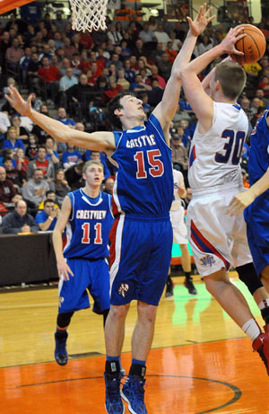 Crestview's Damian Helm (15) gets in the face of Raider Corbin Linder (30) during the two teams' regional finals match-up at Bowling Green on Friday. The Knights won to advance to the final four in Division IV. (Jan Dunlap/Van Wert independent)