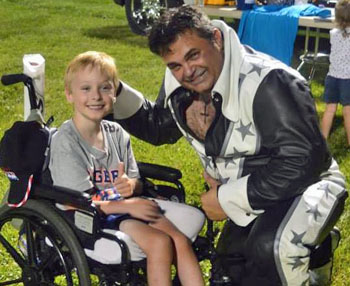 "The Pitbull" poses with Luke Hoffman, son of Carl and Dawn Hoffman of Van Wert.
