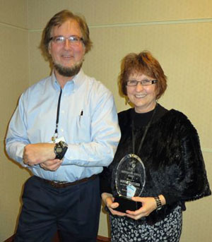 Van Wert teachers Dave Walker and Bonnie Thatcher with items they were awarded at a recent Ohio Federation of Teachers convention. (photo submitted)