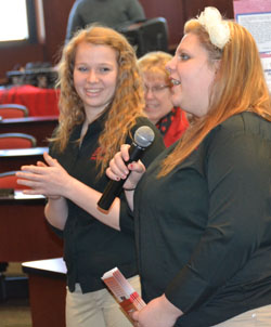Two students from the Family, Career and Community Leaders of America talk about their Honor Flights blanket project. (Dave Mosier/Van Wert independent)