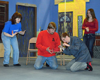 VWCT actors rehearse for the Woody Allen farce, "Don't Drink the Water," now showing at the Civic Theatre. (photo by Monica Campbell