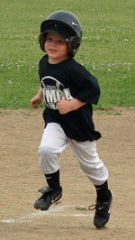 YMCA baseball player Damon McCracken rounding the bases. (YMCA photo)
