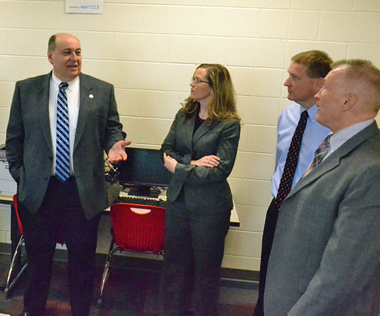 State Representative Tony Burkley (left) talks with (from the left) Van Wert City Board of Education Member Deb Compton, VWCS Treasurer Mike Ruen and Superintendent Ken Amstutz. (Dave Mosier/Van Wert independent)