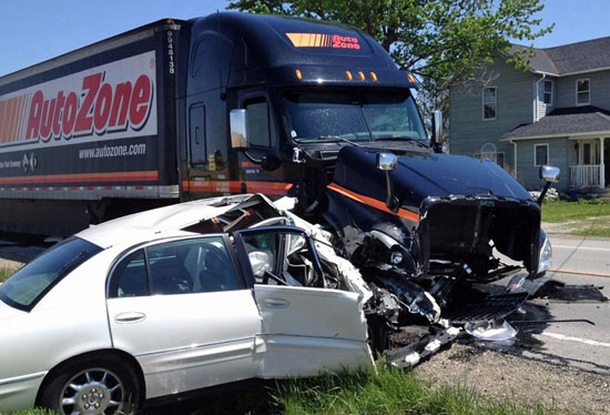 A Centerville woman was killed when this white 2002 Buick head a Freightliner semi head-on on U.S. 127 shortly after noon today. (photo by Rick McCoy for the Van Wert independent)