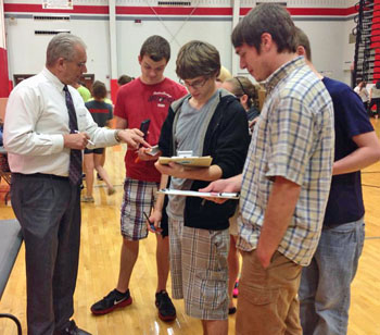 Dave Roach of WERT/WKSD Radio works with seniors to decide which communications plan would be best suited for them during the RMRW simulation held on Monday. (photo submitted)