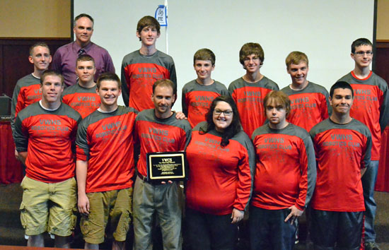 Members of the Van Wert High School Robotics Team pose with their plaque and VWCS Board President Mike Morrow (back row, left). (Dave Mosier/Van Wert independent)
