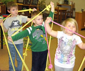 Working together on a sign for the classroom the children learn not only drawing and writing, but how to reflect their thoughts and emotions, and use their small motor muscles. (photo submitted)