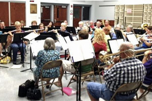 Members of the Van Wert Area Community Concert Band rehearse for Friday's upcoming concert in Fountain Park. (photo submitted)
