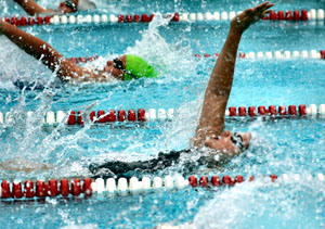 Van Wert Marlins Katie McVaigh (foreground) and Jamie Burenga compete in the 50-meter backstroke finals at Kenton. (photo submitted)