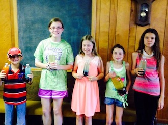Members of Ohio City Blue Ribbon Workers with the lava lamps they made . From left to right are : Kaleb Denmen , Hannah Kraner, Lauren Walls, Alexa Gearhart, and Abbi Marbaugh. (Photo submitted.)