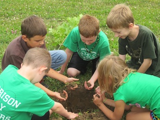 Younger members planted a Red Oak tree.  (Photo submitted.)