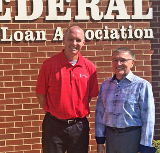 Jerry Beard (right), Niswonger Box Office manager, is shown with First Federal President/CEO Brian Renner in front of the First Federal office, 679 Fox Road in Van Wert. (NPAC photo)