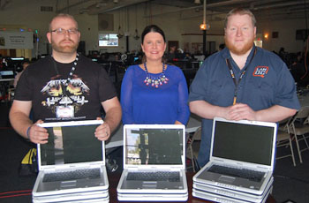 LanOC members pose with donated computers. (photo submitted)