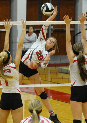 Cougar Alexa Dunlap (20) slams one over the net during Van Wert's volleyball match against Kenton on Thursday. (Jan Dunlap/Van Wert independent)