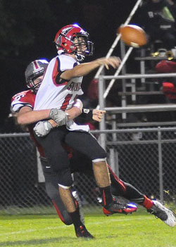 Gavin Cross gets to the quarterback during Friday's win over Shawnee. (Jan Dunlap/Van Wert independent)