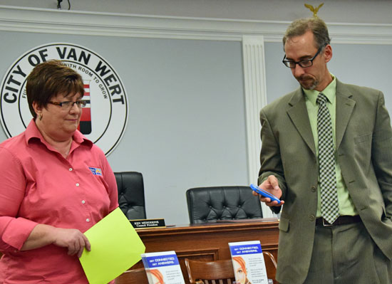 Van Wert County Commissioner Todd Wolfrum makes the first local 2-1-1 call, while United Way Executive Director Deb Russell listens. (Dave Mosier/Van Wert independent)