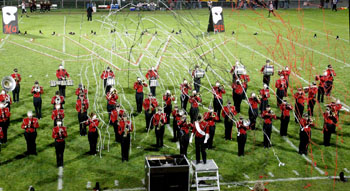 The 2014 “Cougar Pride” Marching Band performs “UnMasqued” in Eggerss Stadium (photo credit Carrie Ann Photography)