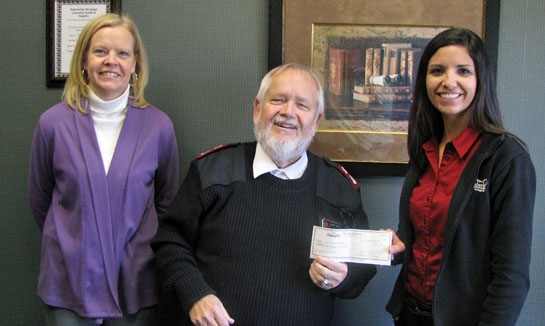 VW Federal gives to Salvation Army 11-2014