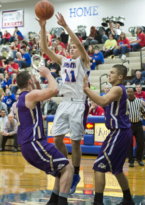 Crestview's Connor Lautzenheiser (11) drains a two-pointer during Friday's game against Ada won by the Knights, 60-40. (Bob Barnes/Van Wert independent)