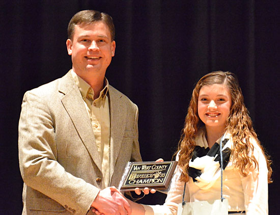 Mark Schumm of Van Wert Federal Savings Bank with 2014 Van Wert County spelling champion Carly Wendel. (VW independent file photo)