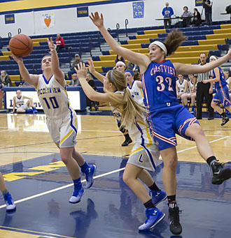 Crestview and Lincolnview players fight for a loose ball during their NWC contest Thursday night. The Knights got the win, 53-35. (Bob Barnes/Van Wert independent)