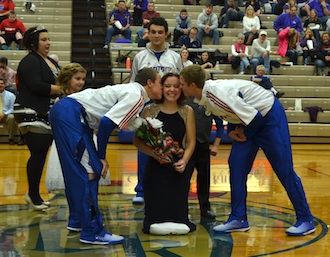 Senior Vicky Callow was crowned winter homecoming queen before Christmas break. Basketball players Preston Zaleski and Connor Lautzenheiser helped with Callow’s coronation. (Photo submitted.)
