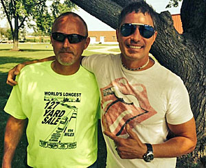 Gene Tracy, owner of Tracy’s County Flea Market & Auction Services (left), is shown during filming last summer during the 127 Yard Sale with Paul Brown, host of “The Endless Yard Sale.” (photo submitted)