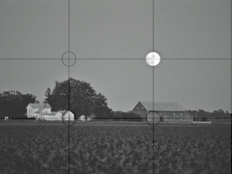 Photograph of a summer moon with a Rule of Thirds grid superimposed on it. (Photo: Rex Dolby)
