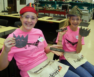 Pictured are two participants from a past “Step Into Your Future” event with their metalwork projects. (Vantage photo)