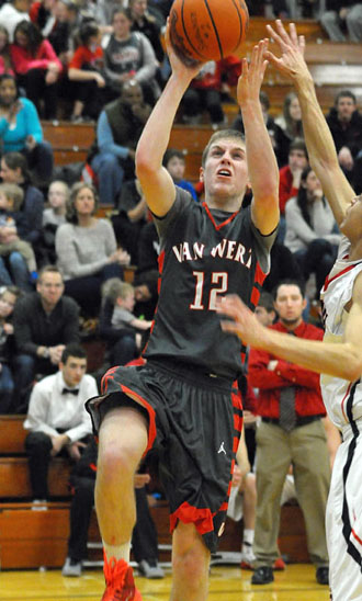 Cougar Josh Braun (12) scores inside against Shawnee during Friday's WBL contest won by the Indians, 59-47. (Jan Dunlap/Van Wert independent)