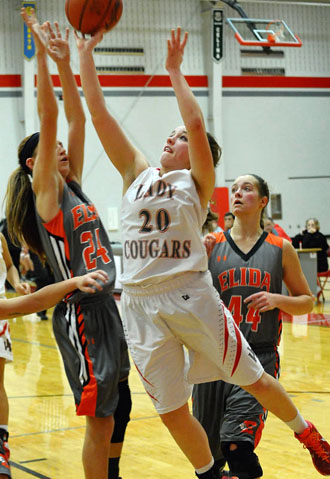 Cougar Alexa Dunlap (20) goes up for a shot in Thursday's game against Elida. The Lady Bulldogs won the contest, 68-63. (Jan Dunlap/Van Wert independent)